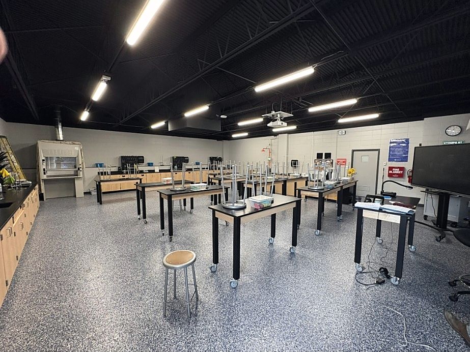 School science laboratory lit by new linear LED fixtures